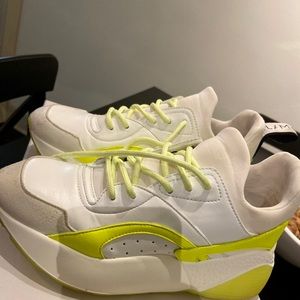 Designer sneaker . Lightly worn in great condition